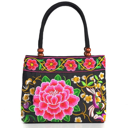 Small women's shoulder bag with floral embroidery, top handle, and flap with bead embellishments