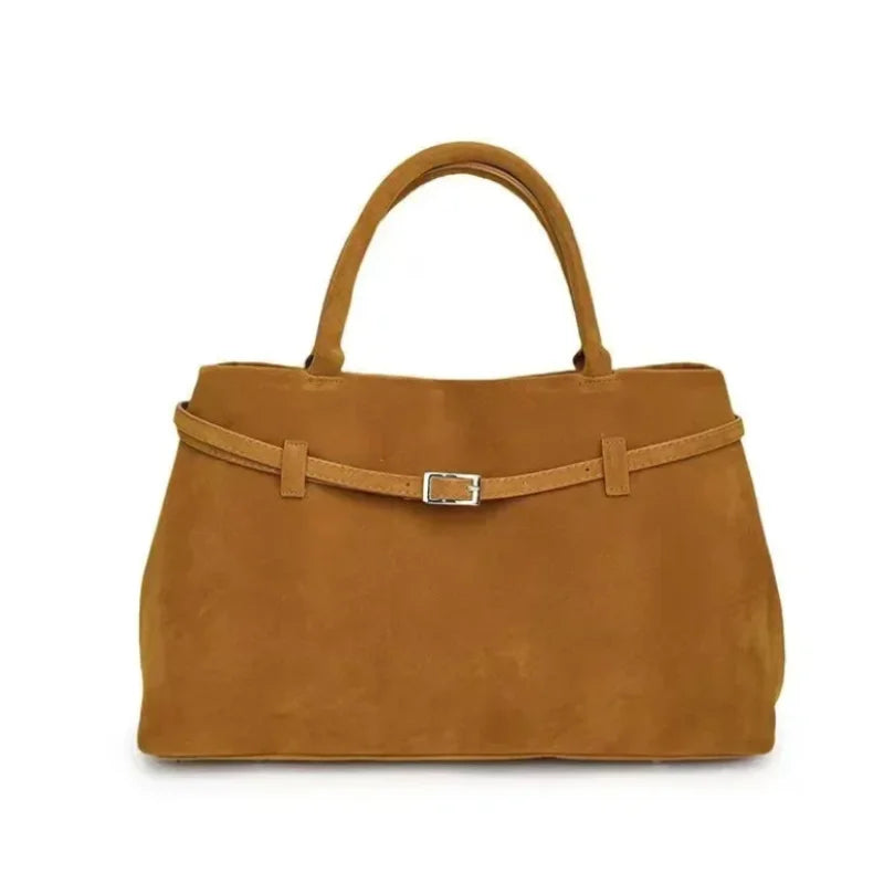 Women's handbag made of synthetic suede with a decorative buckle, large capacity, and snap closure