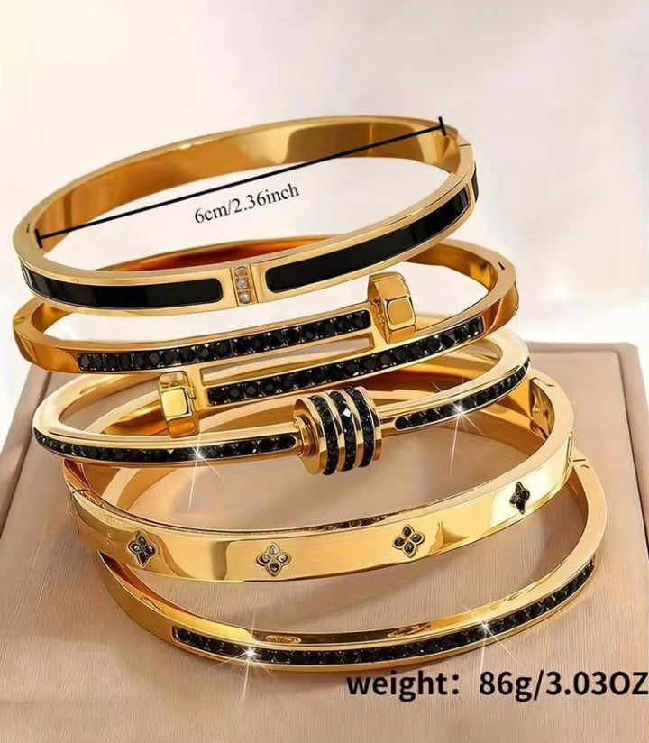 Set of 5 stainless steel bracelets—charming, delicate, and modern—featuring sparkling cubic zirconia