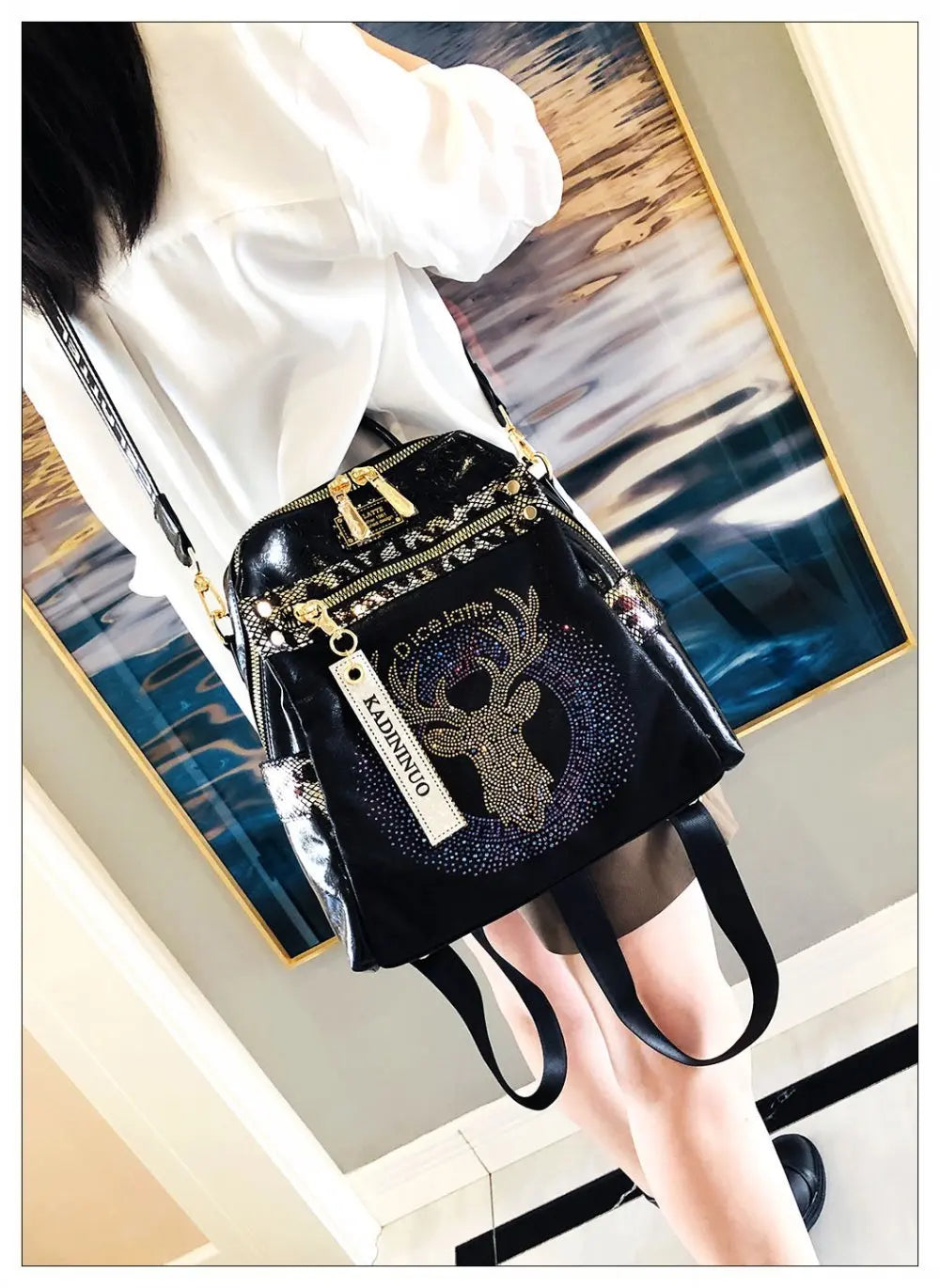 Stylish, modern, and beautiful women's backpack in soft leather with a sparkling rhinestone print