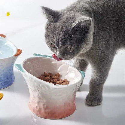 Elevated ceramic bowl, decorative and creative, for cats and pets.