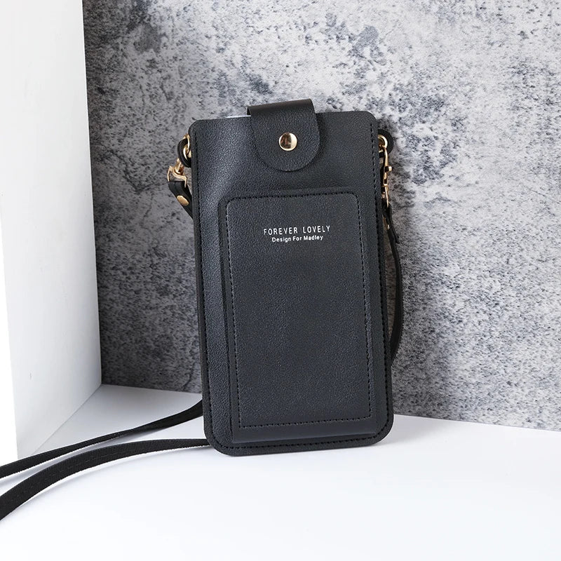 Modern shoulder bag in a solid color, with compartments for cell phone, wallets, and document holder