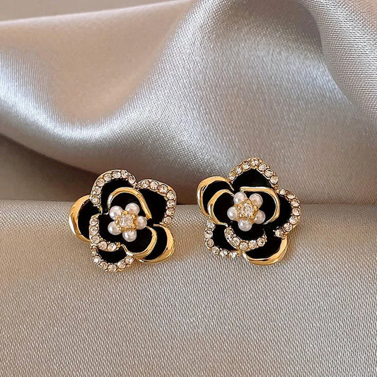 Black Camellia earrings with embedded cubic zirconia and rhinestones, modern and delicate
