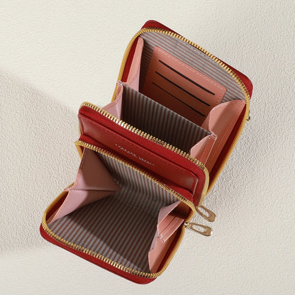 Modern, compact, and secure women's cell phone bag. Holds phones, cards, and documents