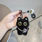 Black and white kitten keychain with big, cute eyes, cartoon plush pendant
