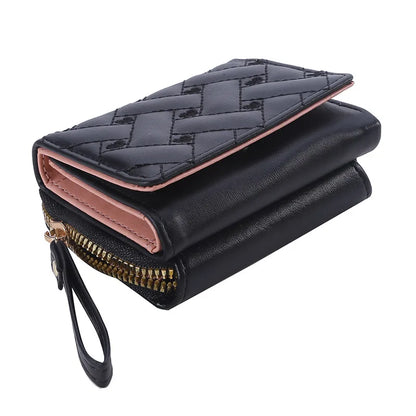 Small women's wallet in leather, elegant design, available in various colors.