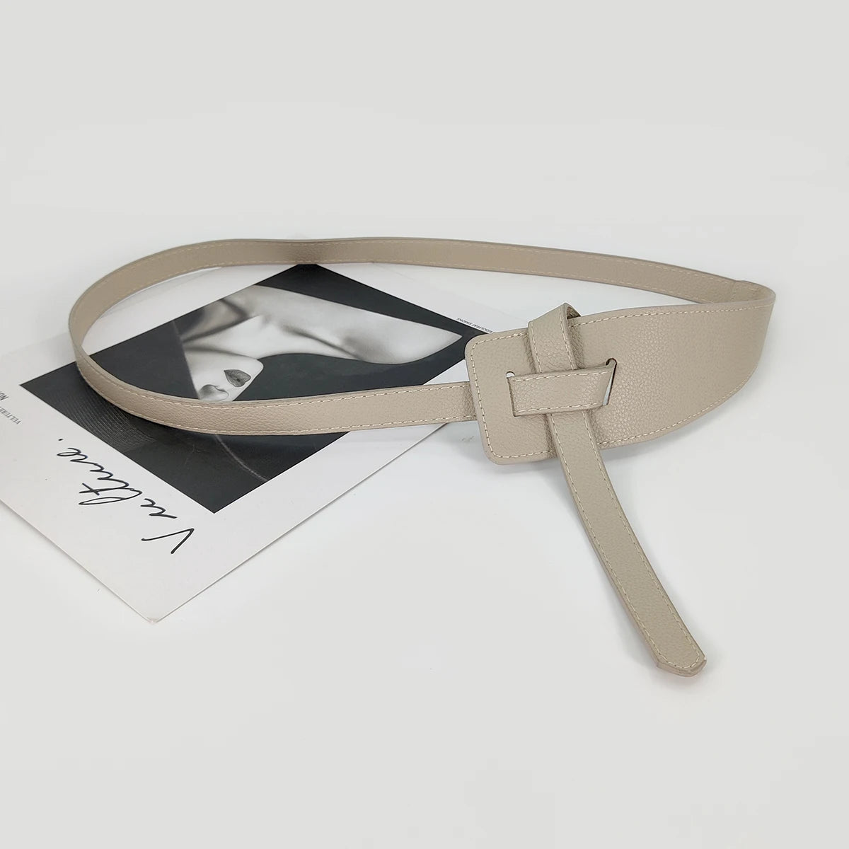 High-quality women's belt in soft leather with a knot, long and wide band, ideal for wearing with coats and dresses
