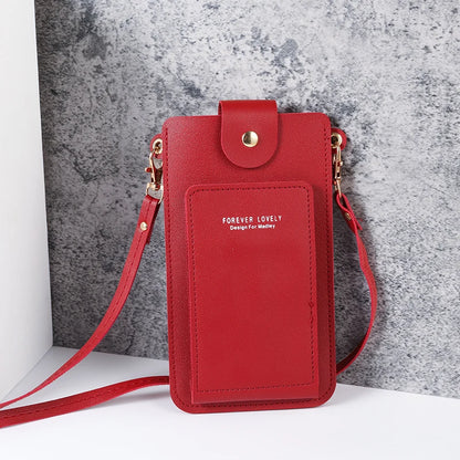Modern shoulder bag in a solid color, with compartments for cell phone, wallets, and document holder