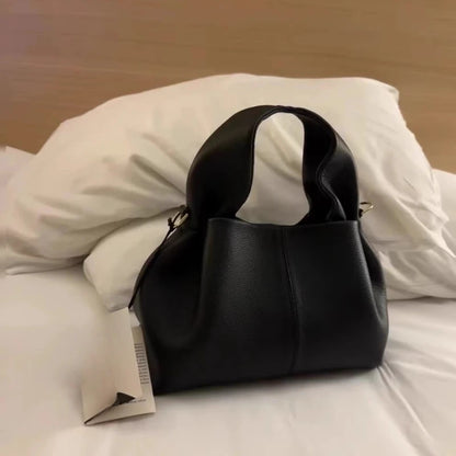 Elegant and sophisticated retro-style women's handbag, simple and versatile crossbody design