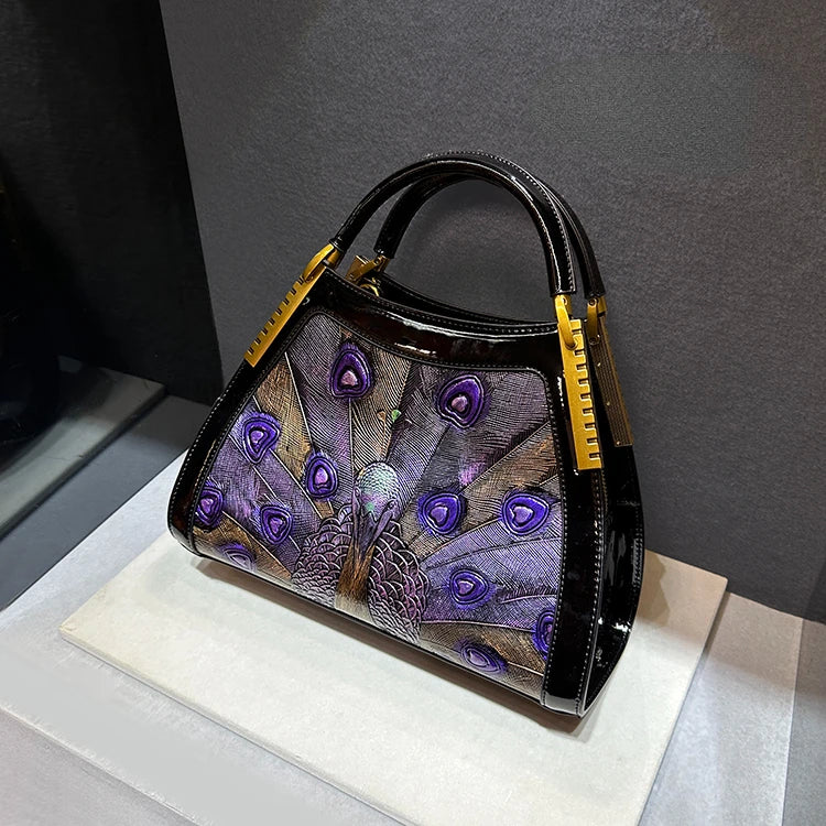 On sale! Women's handbag in high-quality cowhide leather with a peacock print. Shoulder strap is adjustable