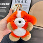 Plush keychain with an adorable and fun dog/rabbit pendant