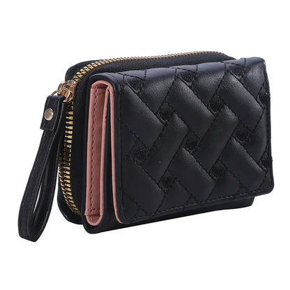 Small women's wallet in leather, elegant design, available in various colors.