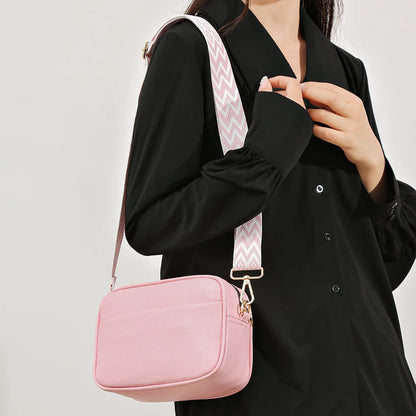 Women's leather tote bag, classic style with crossbody strap and chain detail
