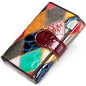 Elegant, compact women's wallet featuring a two-tone design, coin pocket, multiple card slots, and a money clip; crafted from high-quality genuine leather.