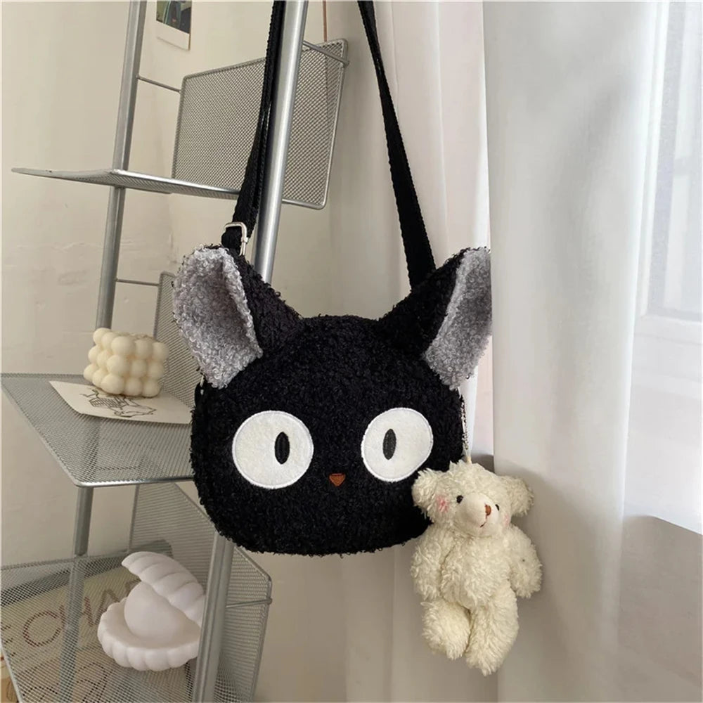 Japanese-style girl's bag in the shape of a plush cat, ideal for wearing on the shoulder or crossbody, compact enough for a cell phone and a wallet