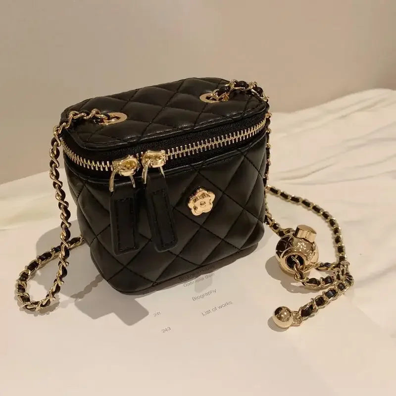 Small women's crossbody bag with a chain strap