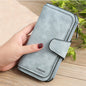 Women's long wallet in high-quality leather, with ample interior space, available in other colors and two different models.