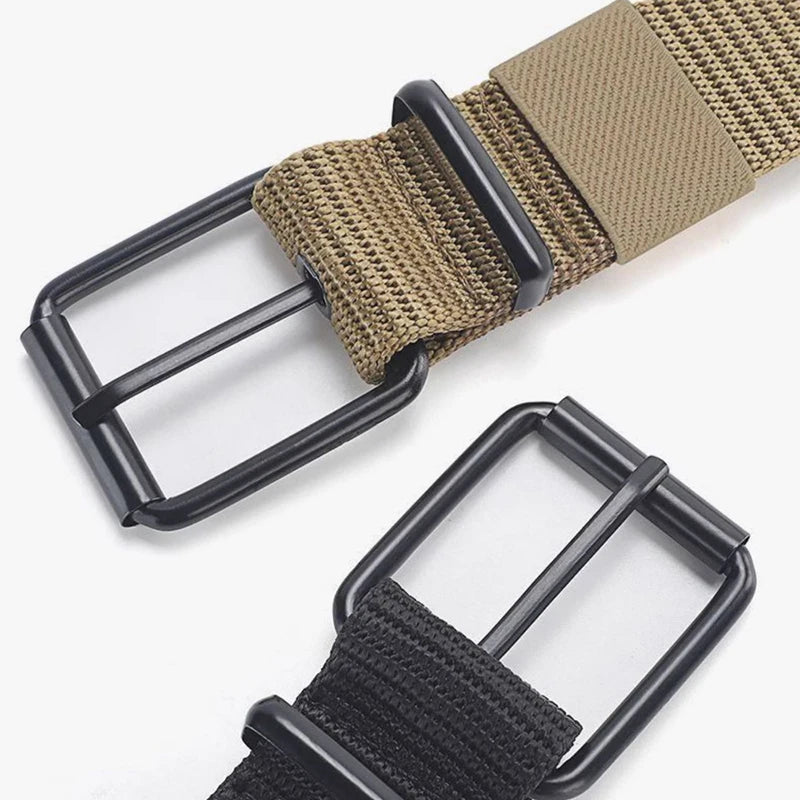 Unisex canvas belt with pin buckle and leather detail. Modern with eyelets and perfect for wearing with jeans.