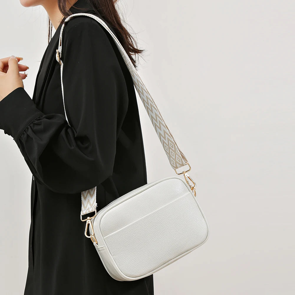 Women's leather tote bag, classic style with crossbody strap and chain detail