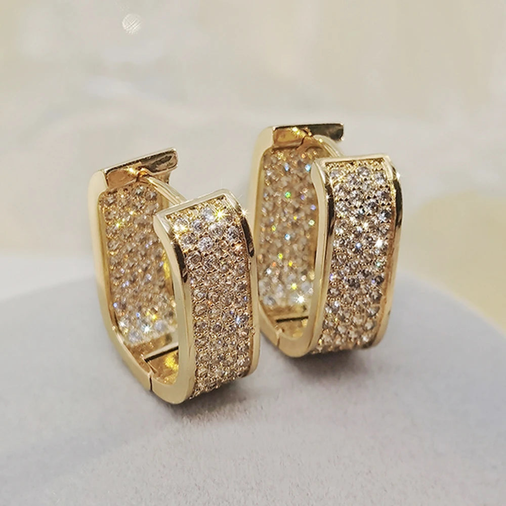 Women's silver or gold hoop earrings set with cubic zirconia