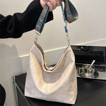 Women's bohemian-style handbag with vintage embroidery and a wide strap