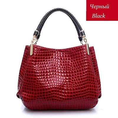Women's satchel and tote bag with crocodile print and top handle. Stylish