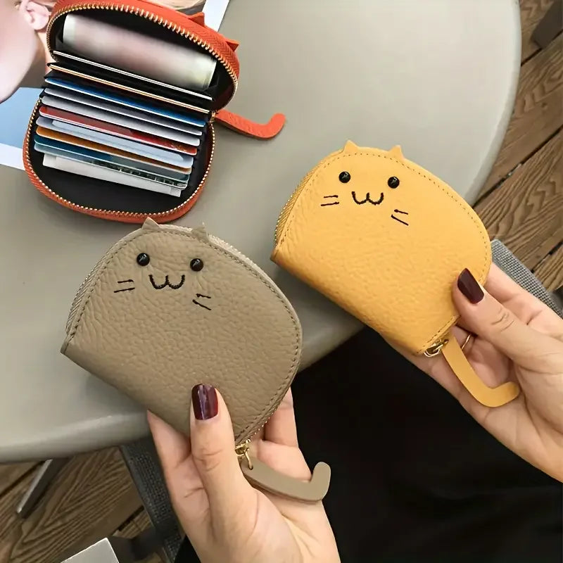Card holder with a cat-shaped design and multiple compartments.