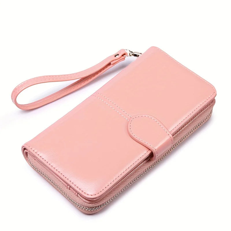 Women's leather wallet with coin and card compartments, available in a variety of colors.