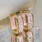 Women's silver or gold hoop earrings set with cubic zirconia