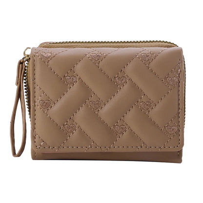 Small women's wallet in leather, elegant design, available in various colors.