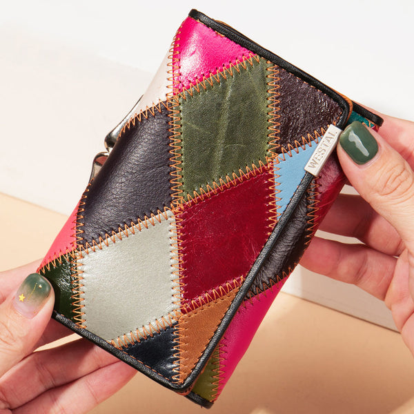 Elegant, compact women's wallet featuring a two-tone design, coin pocket, multiple card slots, and a money clip; crafted from high-quality genuine leather.