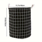 Round, portable fabric laundry basket, ideal for the laundry room or bathroom