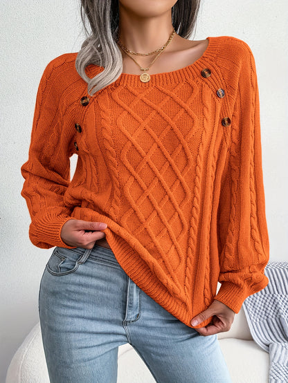 Women's sweater with puff sleeves, textured buttons, and a round neck