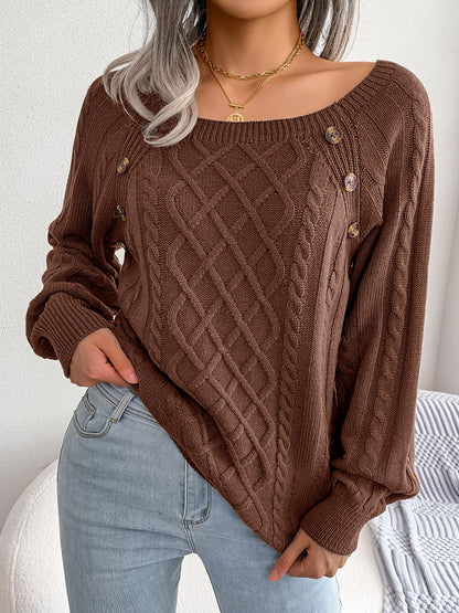Women's sweater with puff sleeves, textured buttons, and a round neck
