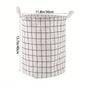 Round, portable fabric laundry basket, ideal for the laundry room or bathroom