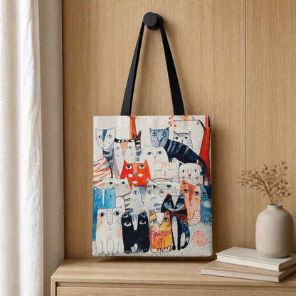 Eco-friendly bag with a print of various cats, ideal for the beach or as a reusable shopping bag