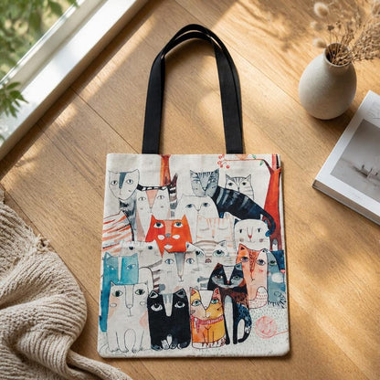 Eco-friendly bag with a print of various cats, ideal for the beach or as a reusable shopping bag